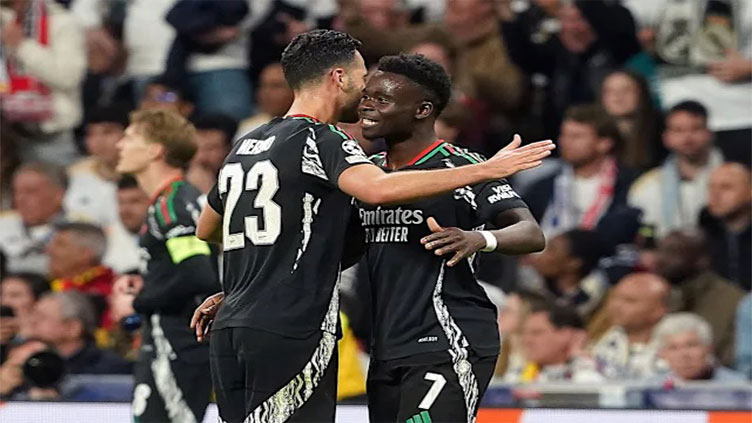 Arsenal oust holders Real Madrid to reach Champions League semis