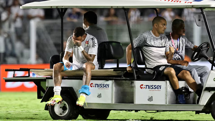 Santos forward Neymar leaves the pitch in tears due to thigh injury